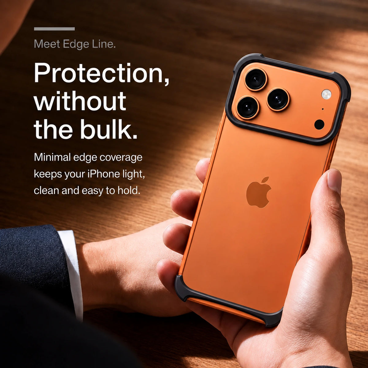 Black open metal bumper phone case held above a wooden desk #color_Midnight Black
