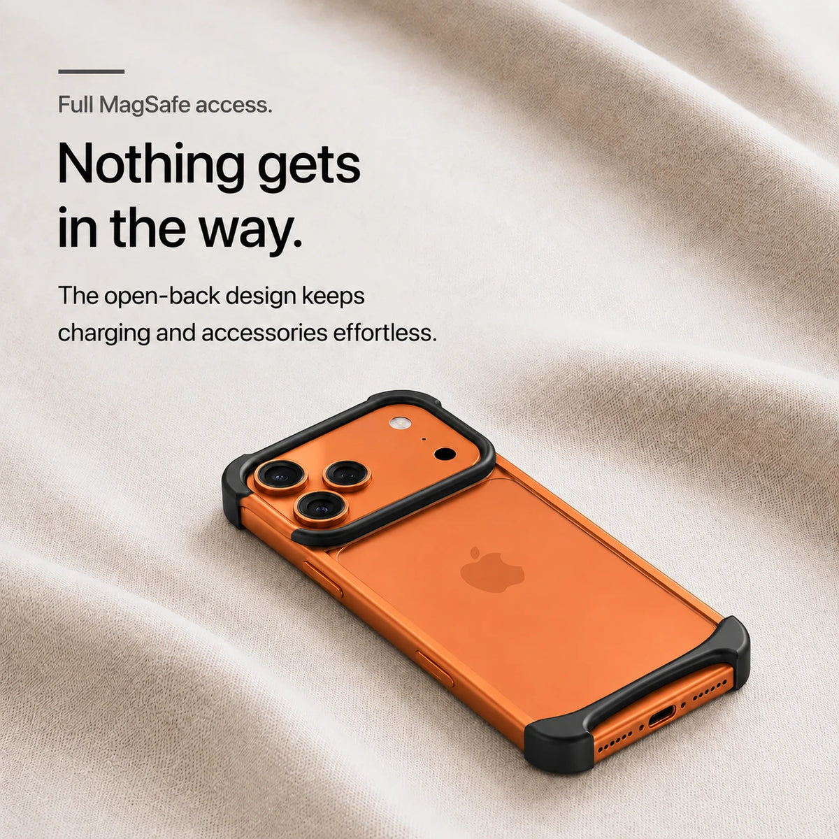 Black open metal bumper phone case on pale fabric showing its open back #color_Midnight Black