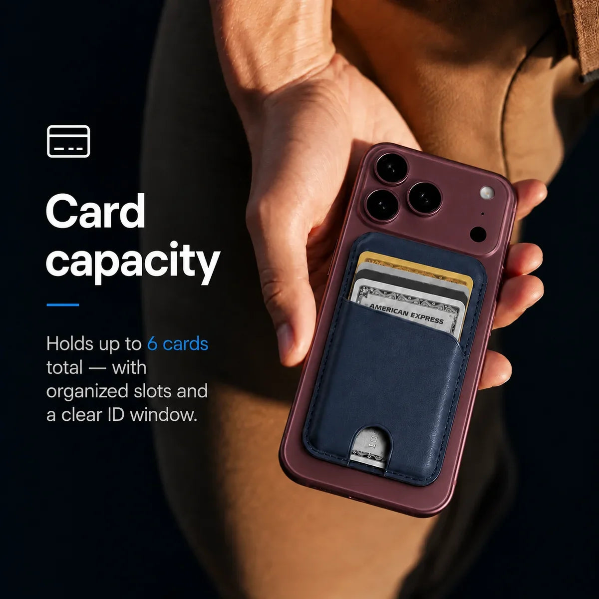 Navy Blue magnetic wallet attached to a Burgundy iPhone held in a hand. #color_Navy Blue