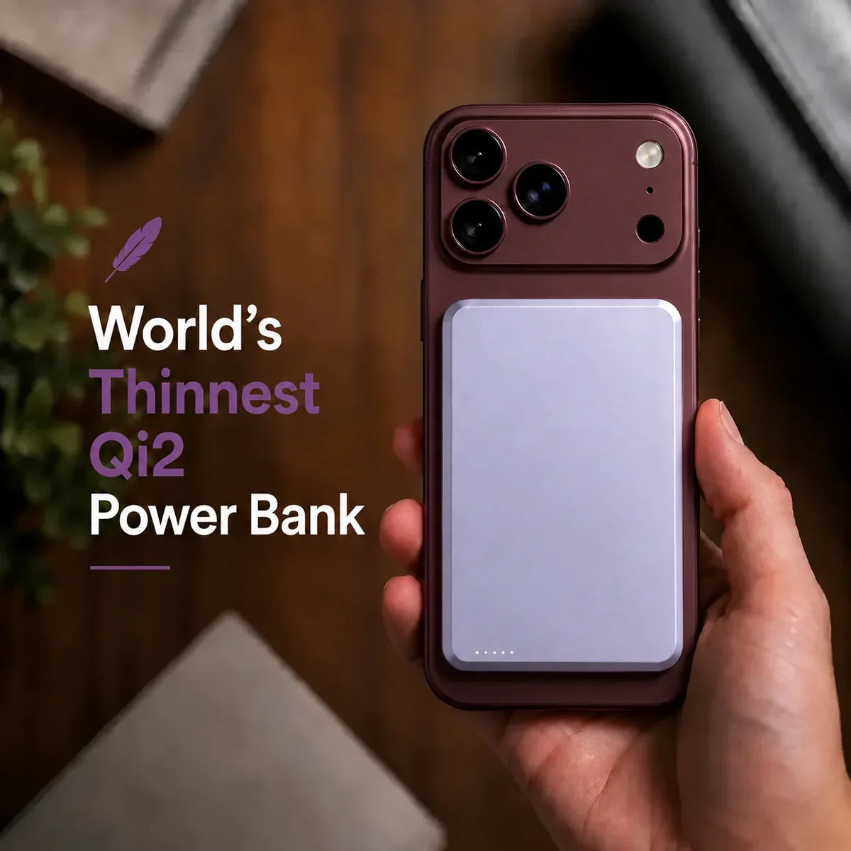 Lavender slim magnetic power bank held on a Burgundy phone. #color_Lavender