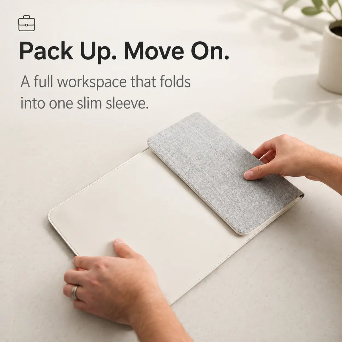 Cloud White wireless charging laptop sleeve folding into a slim sleeve #color_Cloud White