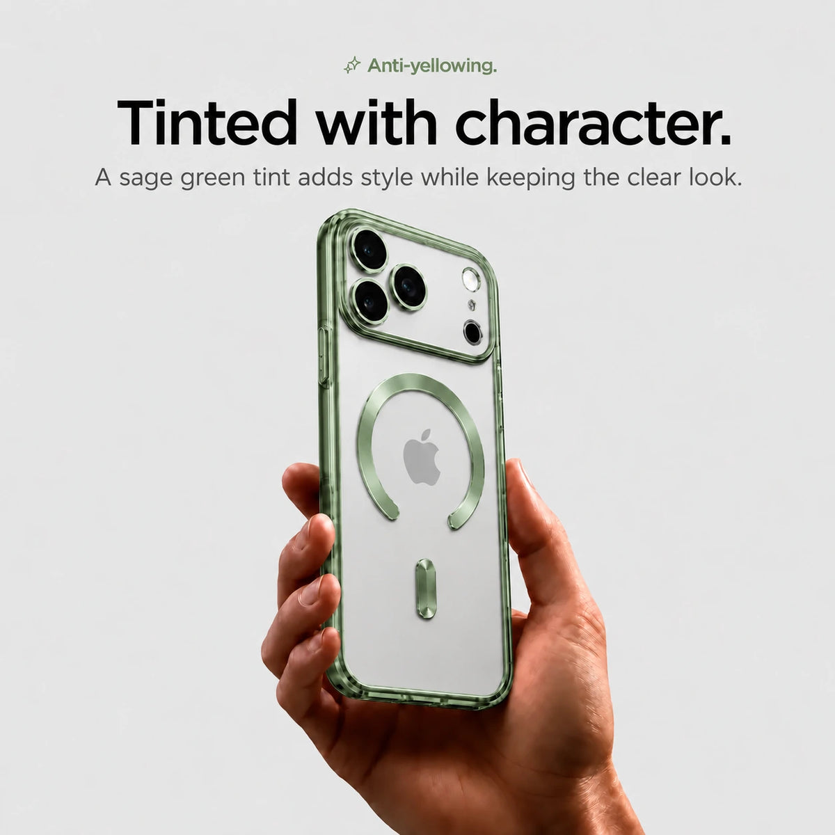 Sage green tinted magnetic phone case held upright in one hand #color_Sage Green