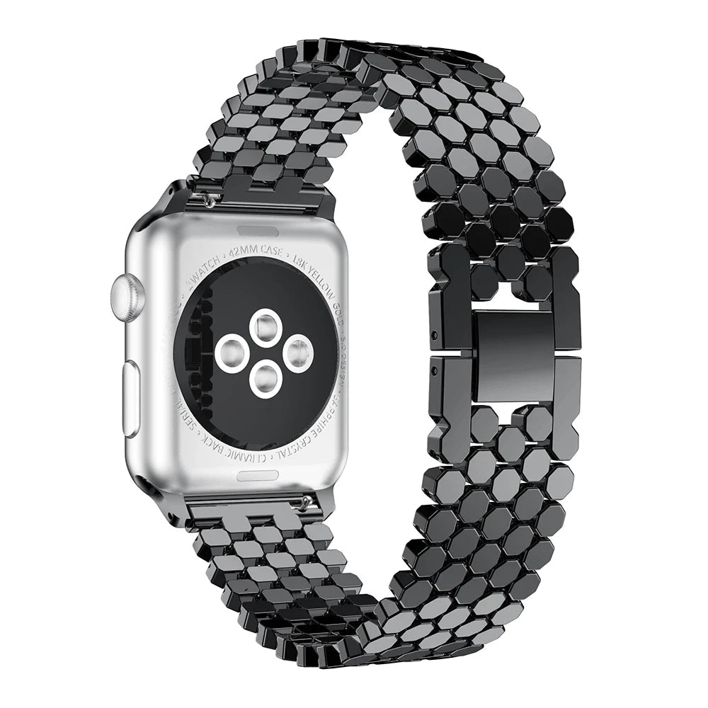 Elegant stainless steel Apple Watch band for women with a polished slim-link design, perfect for formal and casual wear.